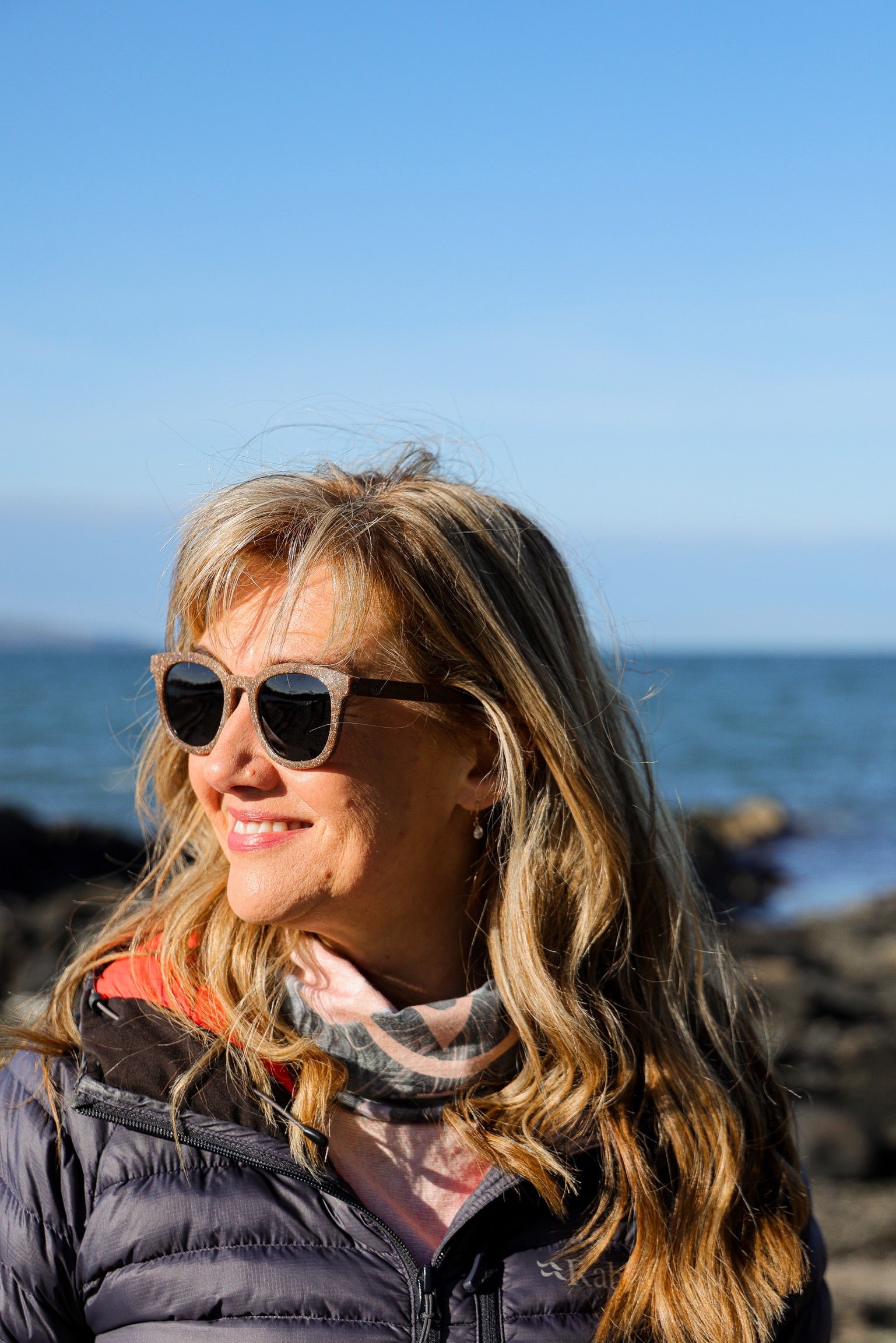 Made with sustainable speckled charcoal wheat straw or coffee residue frame and walnut wood temples, these stylish shades are lightweight, comfortable and eco-friendly with their plastic alternative materials. Fitted with UV400 polarised lenses in a smoke black colour and subtle logo is engraved on the temples. Sunglasses come with a padded pouch and microfibre cleaning cloth. 