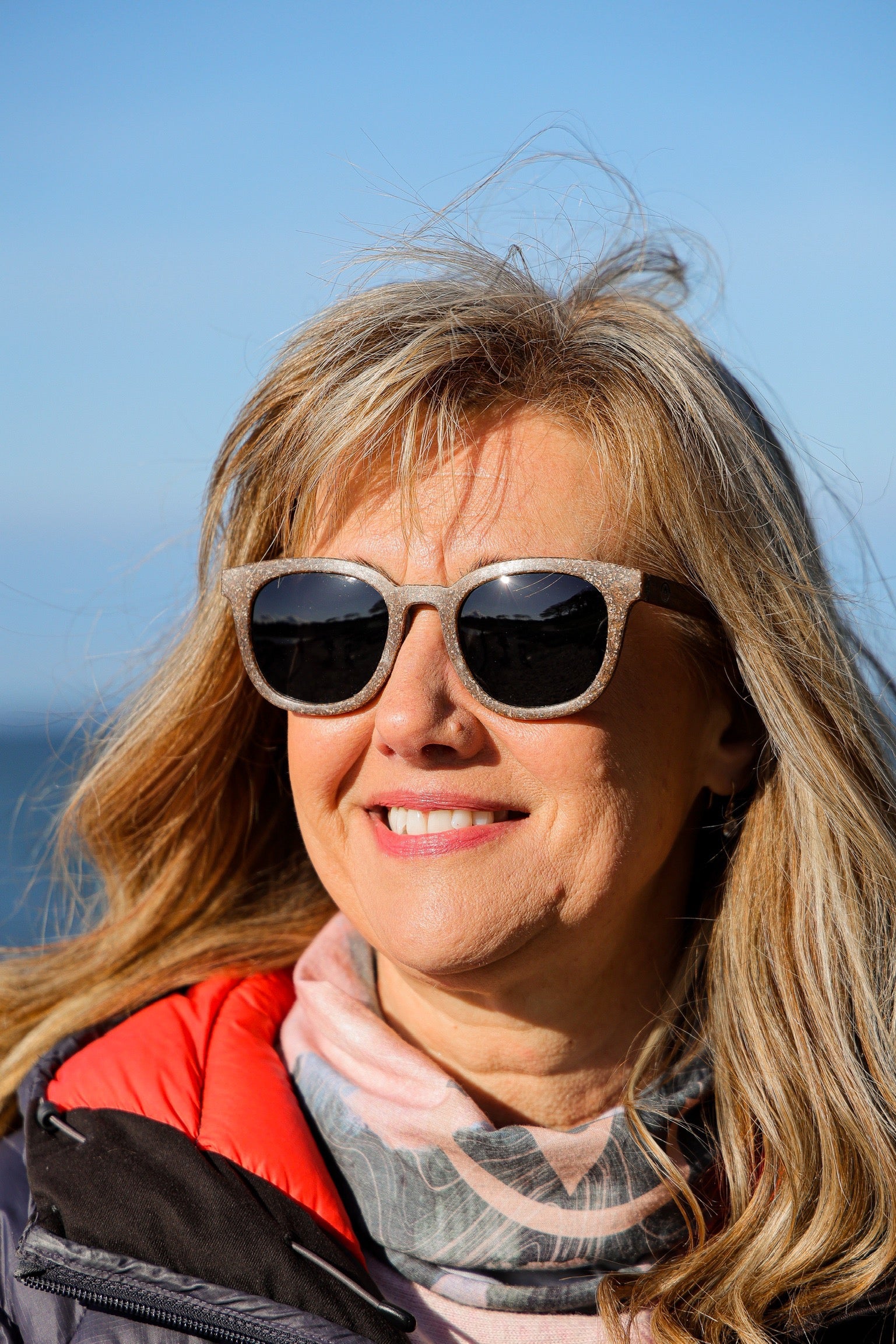 Made with sustainable speckled charcoal wheat straw or coffee residue frame and walnut wood temples, these stylish shades are lightweight, comfortable and eco-friendly with their plastic alternative materials. Fitted with UV400 polarised lenses in a smoke black colour and subtle logo is engraved on the temples. Sunglasses come with a padded pouch and microfibre cleaning cloth. 