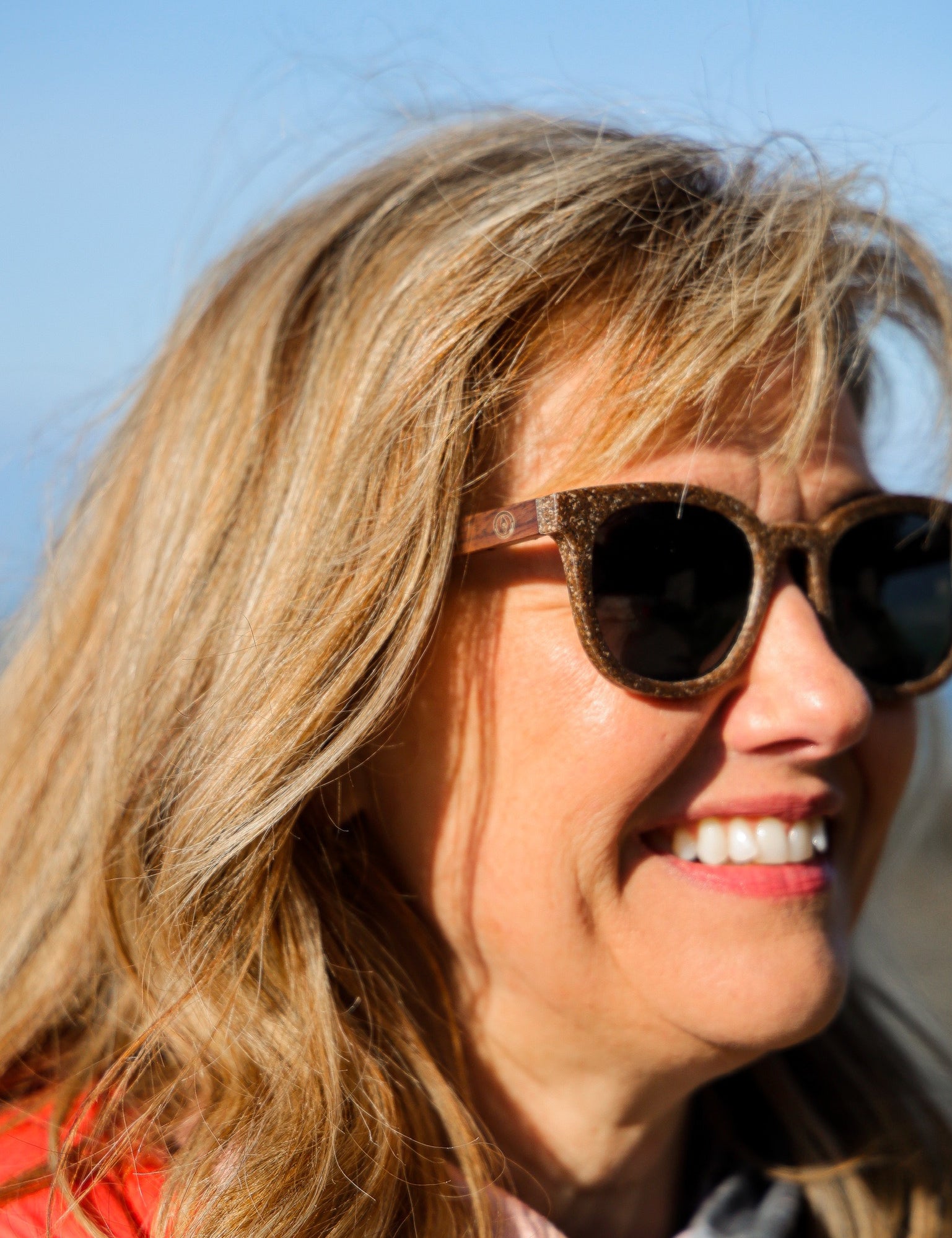 Made with sustainable speckled charcoal wheat straw or coffee residue frame and walnut wood temples, these stylish shades are lightweight, comfortable and eco-friendly with their plastic alternative materials. Fitted with UV400 polarised lenses in a smoke black colour and subtle logo is engraved on the temples. Sunglasses come with a padded pouch and microfibre cleaning cloth. 