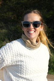 Made with sustainable speckled charcoal wheat straw or coffee residue frame and walnut wood temples, these stylish shades are lightweight, comfortable and eco-friendly with their plastic alternative materials. Fitted with UV400 polarised lenses in a smoke black colour and subtle logo is engraved on the temples. Sunglasses come with a padded pouch and microfibre cleaning cloth. 