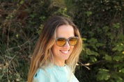 Made with a sustainable speckled wheatstraw or coffee residue frame and walnut wood temples, it's lightweight, comfortable and eco-friendly. Available in charcoal, olive green, coffee and mint frames and fitted with UV400 polarised lenses in smoke, mirrored rose pink and mirrored honey, they are a natural, biodegradable alternative to plastic sunglasses.